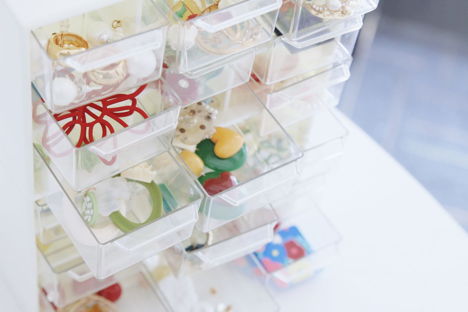 Closet Organization Ideas That Actually Make Getting Dressed Easier 5 Clear drawer organizers holding small accessories and jewelry, photo by Sheilabox via Pexels