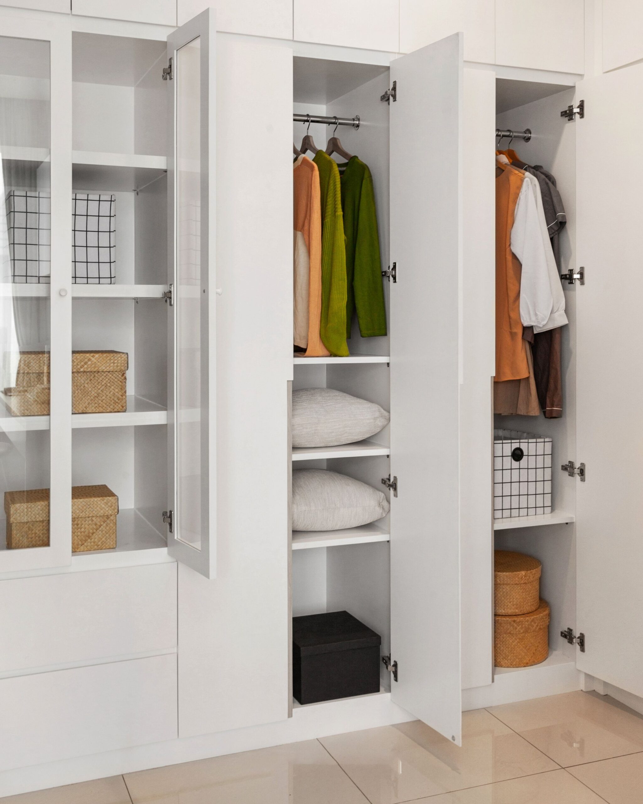 Closet Organization Ideas That Actually Make Getting Dressed Easier 7 Wardrobe shelves with labeled storage boxes and baskets for off season items, photo by Hakim Santoso via Pexels